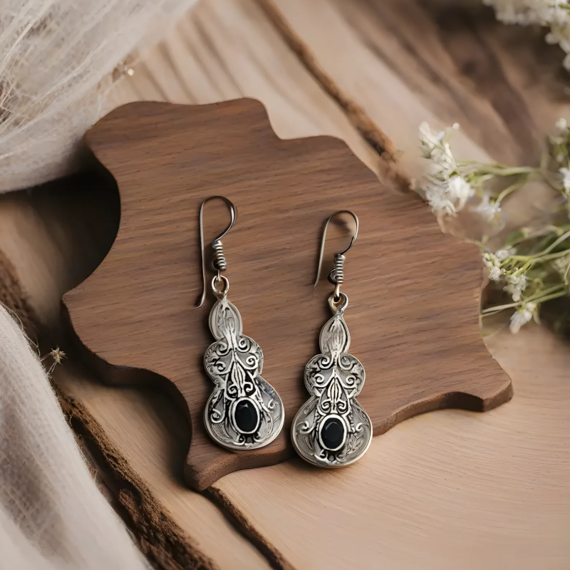 Cercei eleganti cu model berber