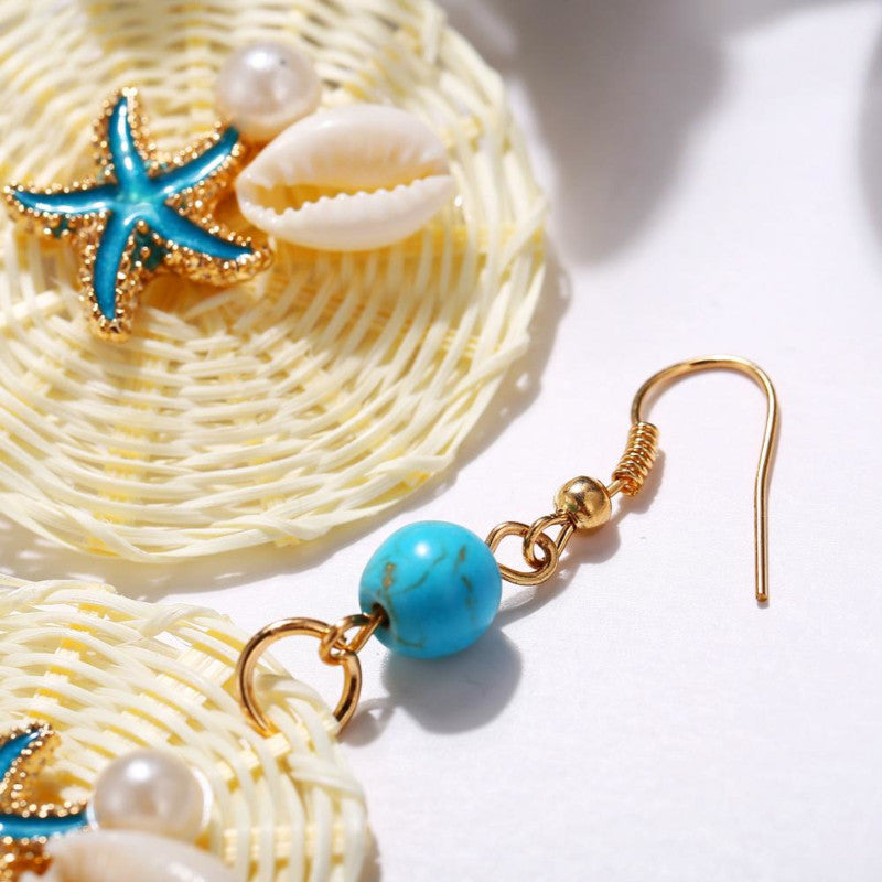 Cercei rotunzi din ratan cu piatră de agat si scoica