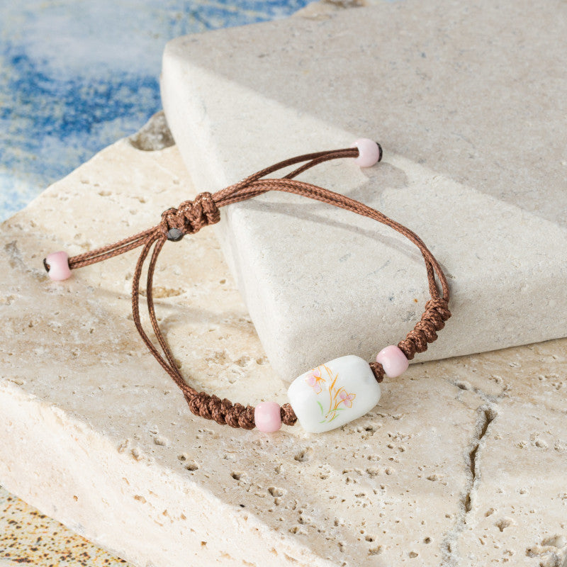 Brătară împletită cu piese ceramice